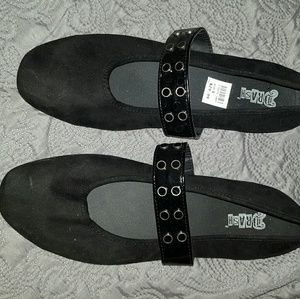Black flats with strap detail